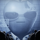 A corporate apple speaking to a captive audience of Fortnite characters, from Epic’s anti-Apple video.